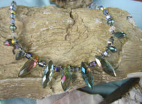 Cut crystal spikey rainbow choker picture