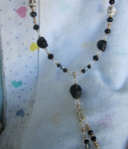 black and white howlite turquoise skull necklace picture